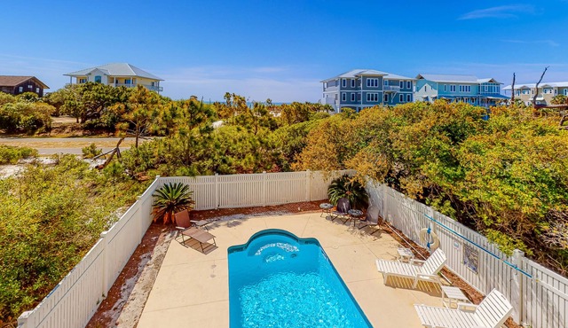 Beach view dog-friendly home with a pool, tennis, fireplace, washer/dryer, grill