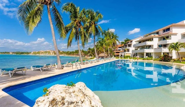 Beachfront condo with loft and sea views