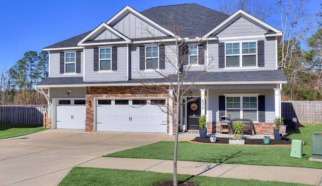 Charming Masters Week Home with 1/2 acre backyard.