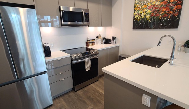 Cozy Lake Simcoe 2 bedroom condo with a garden walkout to the boardwalk/Pier.