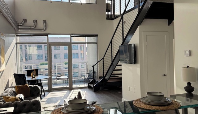 Exclusive 2-Bed Loft in Atlantic Station—A Unique FIFA Escape.