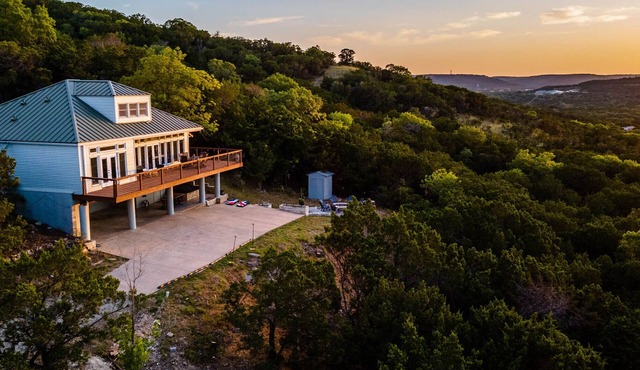 Hillside Glass House Nestled in Bird Sanctuary