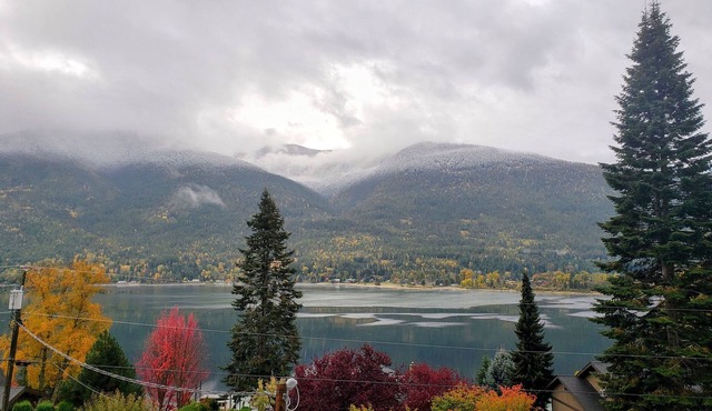 Lake view boho inspired home with heated covered parking in Nelson