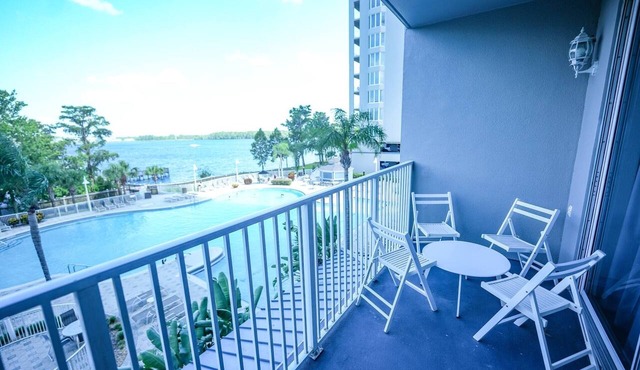 Lakefront resort condo w/balcony, pool, jacuzzi & arcade fun!