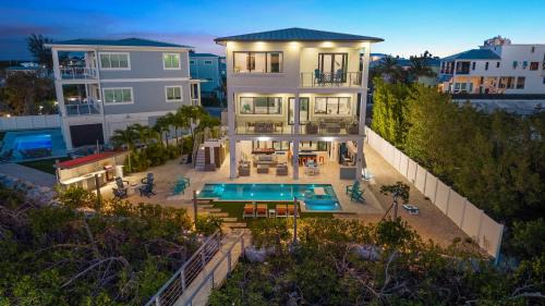 Luxury Seaside Escape ~ Heated Pool w Jacuzzi ~ Elevator ~ Dock ~ Scenic Views
