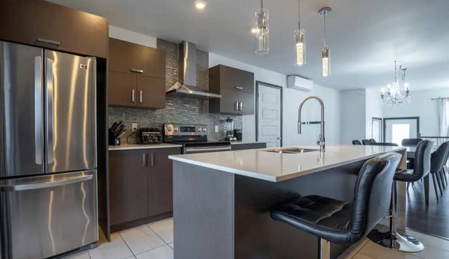 Magnificent 2-storey condo only 15 minutes from downtown Montreal