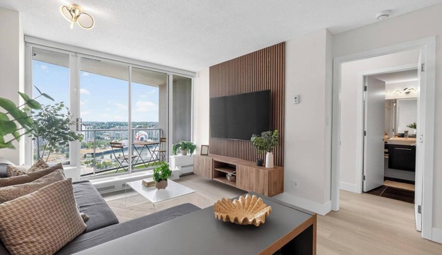 Modern & Spacious 2BR + Den Near BC Place Parking Pool