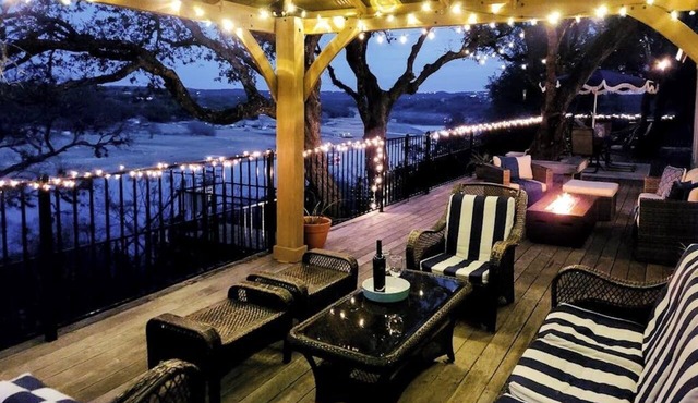 Natural cliffside oasis with impressive views, gas fireplace and dock