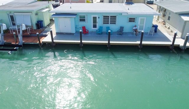 Oceanside waterfront 2/2 home with 55ft dock and paddle equipment