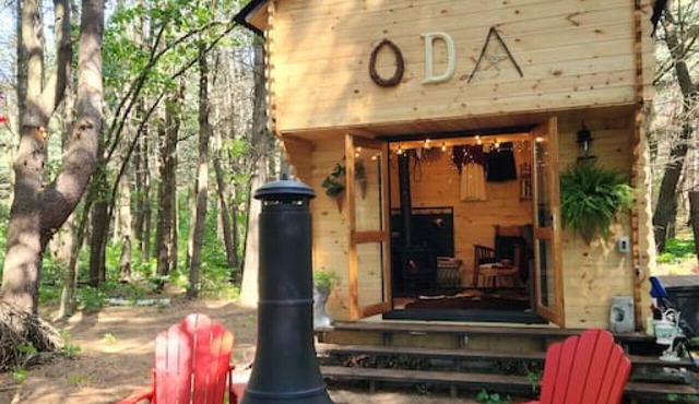 `Oda` Log Cabin with Cedar Hot Tub & Sauna on wood
