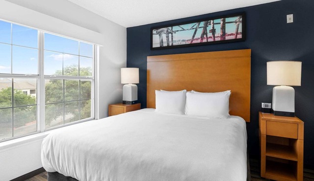 One Bedroom King Suite - Domain Area with a Pool