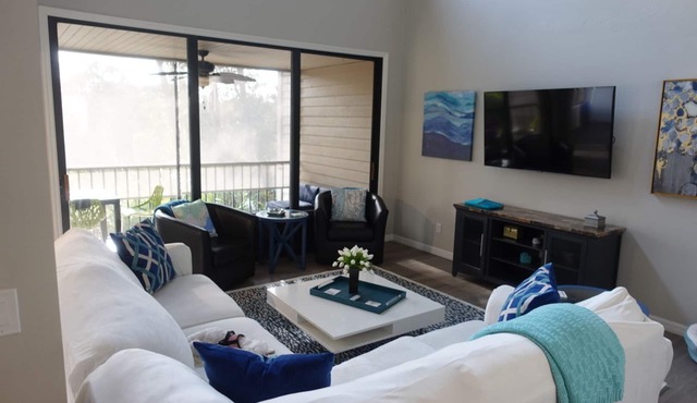 OPEN FL PLAN, UPDATED TOWNHOUSE IN EXCLUSIVE BONITA BAY CLUB, OAKWOOD COMMUNITY