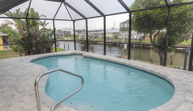 Pool + Waterfront + No Bridge Gulf Access + Dock + 3 Bedrooms, 4 beds, 1 sofabed