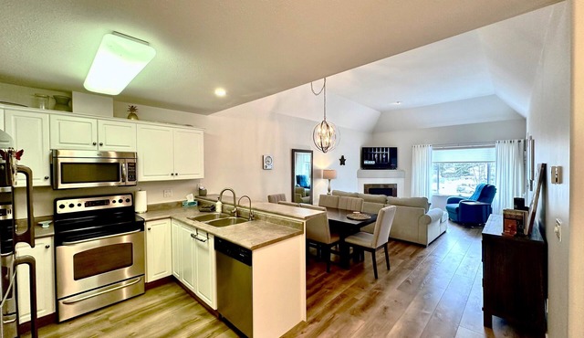 Riverside Revive Condo w/Boat Slip, Outdoor Pool & Hot Tub, Cozy Outdoor Patio