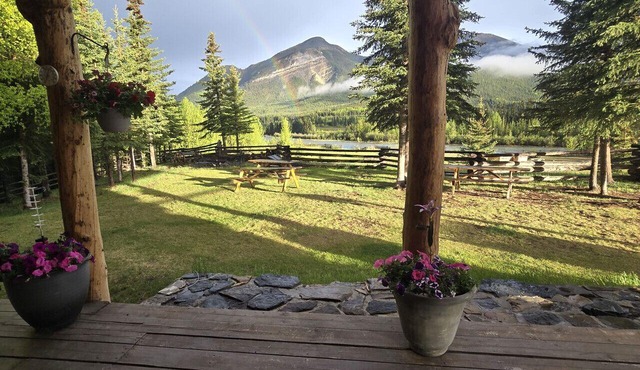 Room 2 at the Main Lodge with a queen bed and single bed.