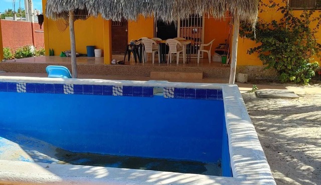 Spacious Gated Beach House with a pool. Less than 150 meters from the beach