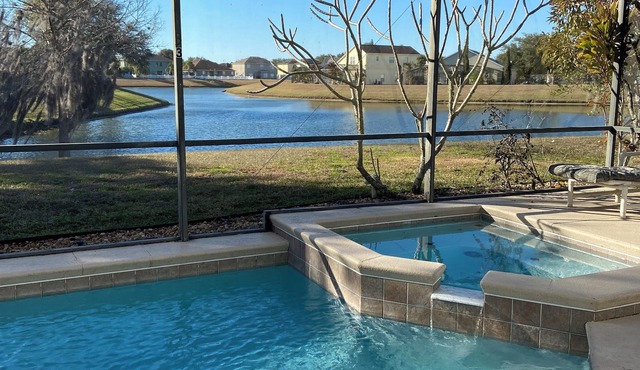 Tranquil 4-bedroom house on the lake with amazing sunset views.