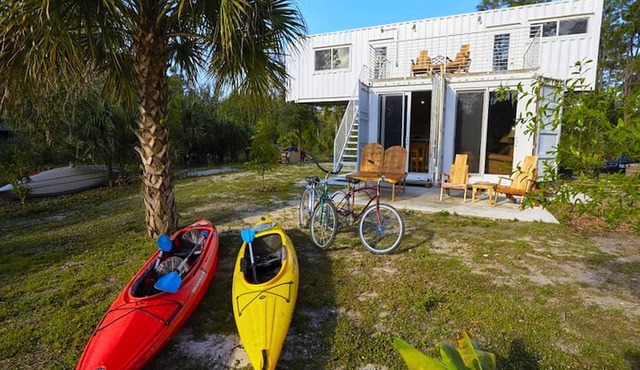Upcycled Shipping Containers Transformed into a Glamping Home for a Unique Florida Vacation