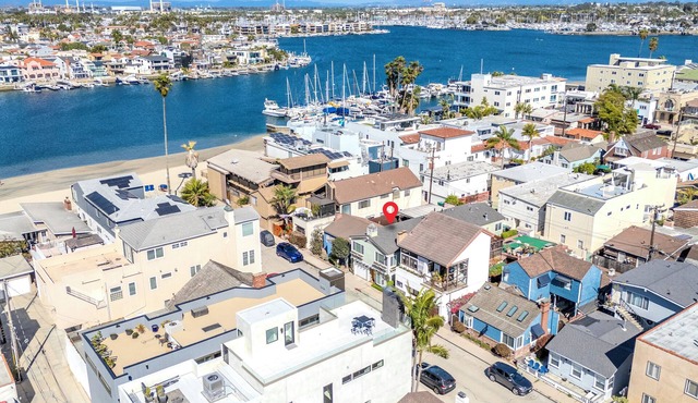 Walk to Both the Beach & Bay-Peninsula Home with Two-Car Garage