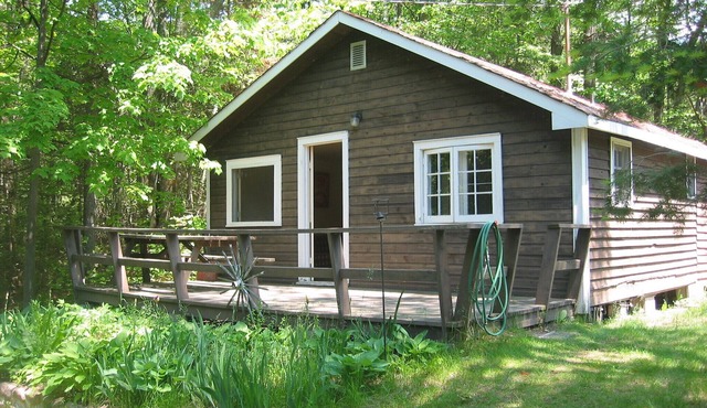walk to private beach across the street -2BR Cozy Forest Cabin -amazing sunsets