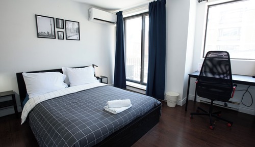 Queen Room with Shared Washroom