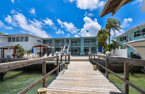 Bay Esplanade Apartment | Enchanted Inn Suite #4: Waterfront, Pool, Fishing Dock, Boat Docks & Tiki Bar!