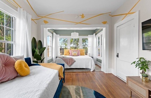 Kessler Apartment | Artsy urban retreat steps from Bishop Arts. Thoughtfully designed with creative touches, a dreamy coffee station, and a king bed you won't want to leave. Gated parking and a responsive host. Repeat guests say it's even more beautiful in person.