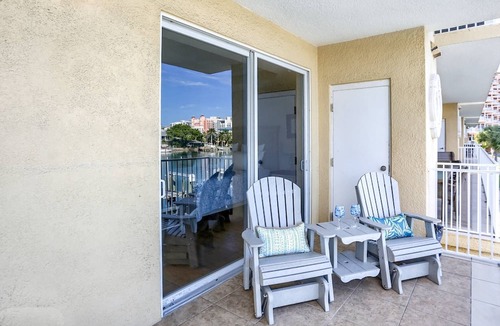 Clearwater Beach Condo | Pets Allowed! Newly Furnished, Waterfront Balcony, Heated Pool, FREE Activities ~ 204 Bay Harbor