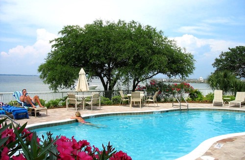 Fort Walton Beach Condo | Penthouse-Directly ON Water-Huge Roof Top Patio-Private Hot Tub-Gorgeous Views!