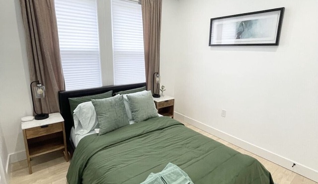 Chic 2BR w/Urban Patio + Walk to NYC Transit